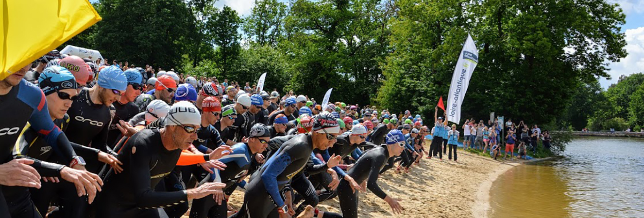 Départ du Triathlon du Pays de Redon 2018 à l'Etang Aumée, Fégréac (Loire-Atlantique) Départ du Triathlon du Pays de Redon 2018 à l'Etang Aumée, Fégréac (Loire-Atlantique)